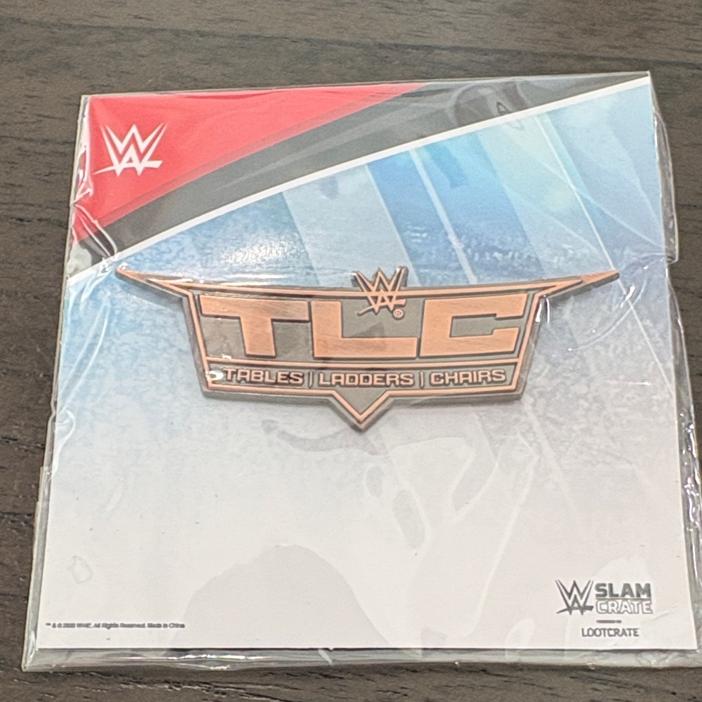 WWE TLC Bronze Enamel Pin